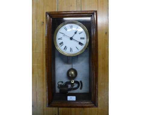 A French oak electric wall clock, with porcelain dial and sweep second hand 