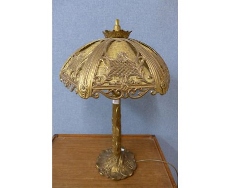 An Art Nouveau style brass table lamp 