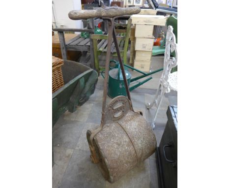 A cast iron Premier garden roller 