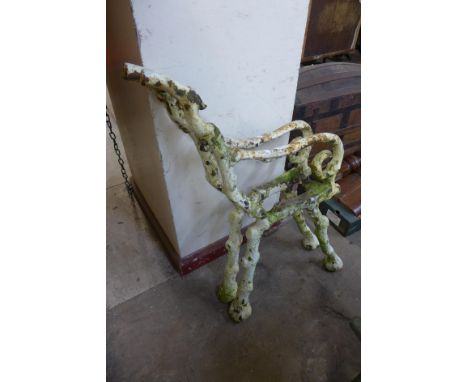 A pair of Victorian naturalistic cast iron bench ends 
