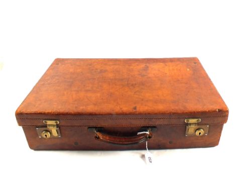 A vintage leather bound travelling case with Brass locks