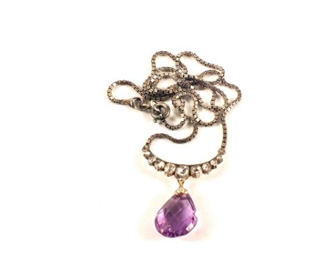 A yellow and white metal mounted old cut Diamond with Amethyst drop