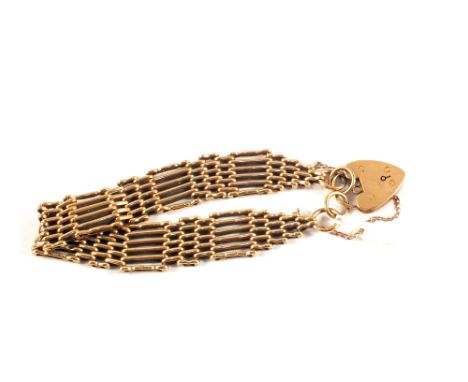 A 9ct Gold gate link bracelet with heart shaped padlock
