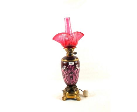 A Victorian mauve pottery oil lamp painted with classical heads (converted)