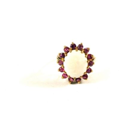 A 9ct Gold Ruby and Opal cluster ring, size J (hallmarks rubbed)