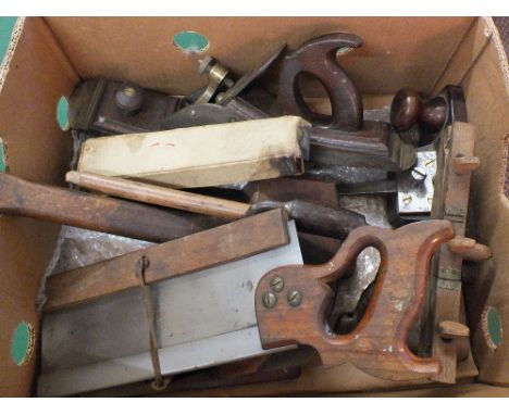 A box of various woodworking tools