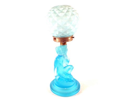 A German blue frosted glass table lamp in the form of a kneeling unclad lady with pineapple shade, attributed to Sweig Meulle