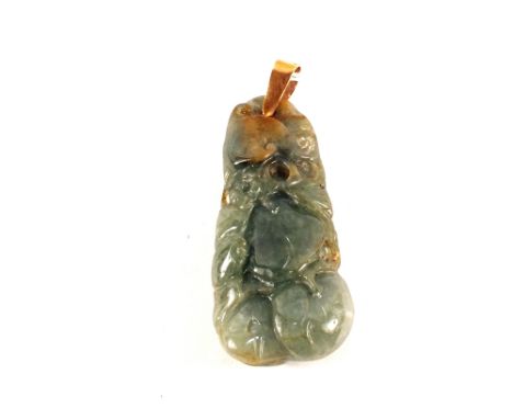 A nicely carved Jade pendant on yellow metal mount