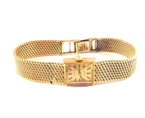 A lady's 9ct Gold Tissot watch on strap (strap as found)