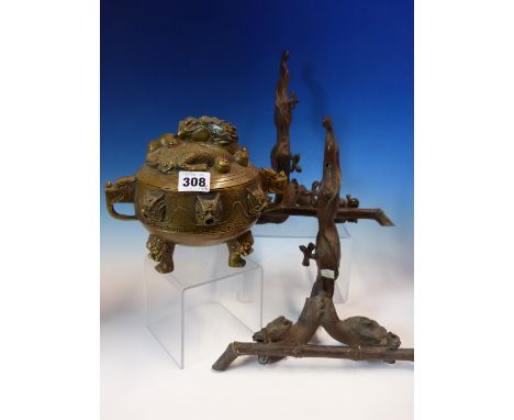 A CHINESE BRONZE TWO HANDLED INCENSE BURNER AND COVER CAST WITH DRAGONS, SIX CHARACTER MARK.   Dia. 18cms.  TOGETHER WITH A P