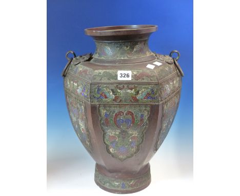 A CHINESE CHAMPLEVE ENAMELLED BRONZE HEXAGONAL SECTIONED BALUSTER VASE WITH MASK AND RING HANDLES ABOVE LAPPET PANELS OF BIRD