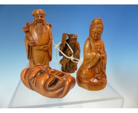 FOUR WOODEN NETSUKE, TWO DEPICTING MEN, ANOTHER KWANNON AND THE FOURTH AN ONI MASK