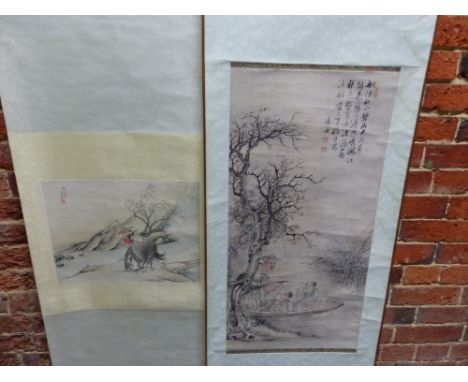 TWO CHINESE SCROLL PAINTINGS, ONE WITH AN ELDERLY MAN PUNTING TWO CHILDREN PAST AN AUTUMNAL TREE.   87 x 43.5cms. THE OTHER O