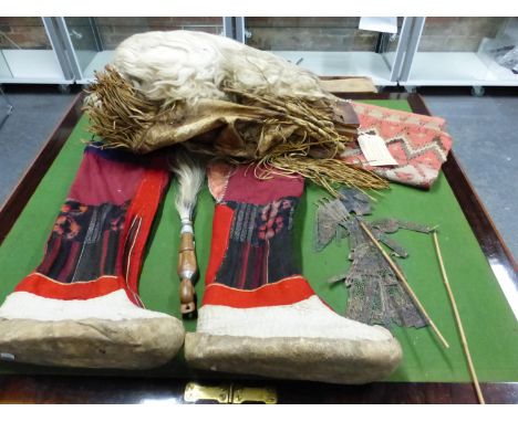 A PAIR OF TIBETAN BOOTS, A VOURKA SHEPHERDS BAG, A KILIM PANEL, A FLY WHISK, A BURMESE PUPPET AND THE 2000 RYLSTONE AND DISTR