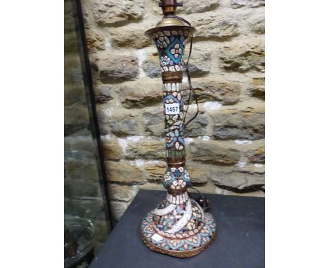 AN EGYPTIAN CHAMPLEVE ENAMELLED COLUMNAR TABLE LAMP WITH FOUR BANDS OF INSCRIPTION SPIRALLY UP FROM THE COPPER EDGED CIRCULAR