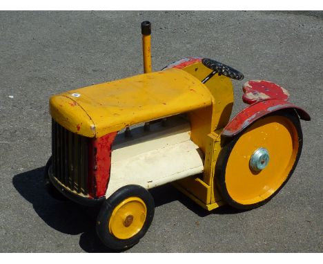 FAIRGROUND RIDE TRACTOR C.1930/50 JUVENILE SIZE FUNFAIR CARROUSEL RIDE, WITH SEAT, WHEELS AND STEERING WHEEL & UNDERFLOOR MOU