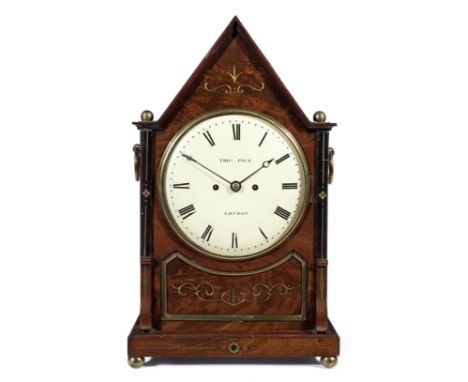 An early 19th century brass-inlaid mahogany table clockThomas Pace JrThe pointed arched case with ball finials and side ring 