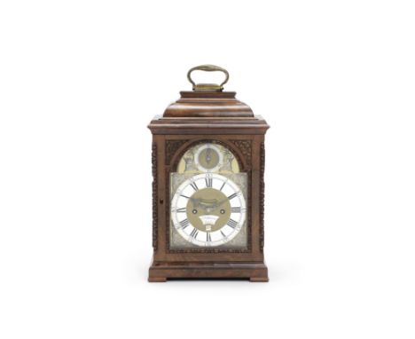 A fine and rare mid 18th century silver-mounted carved mahogany quarter repeating table clock with exhibition provenanceDelan