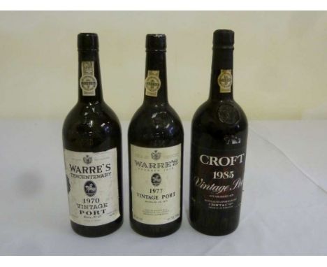 Three bottles of vintage port to include Warres Tercentenary 1970, Warres 1977 and Croft Vintage 1985
