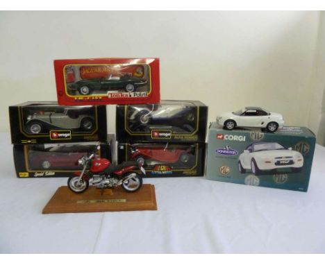 1/18 scale Burago and Maisto, 2 Burago Jaguar 85100, 1 Maisto Jaguar XJ220, 1 Maisto Motorcycle BMW R1100 (unboxed) and MG MG