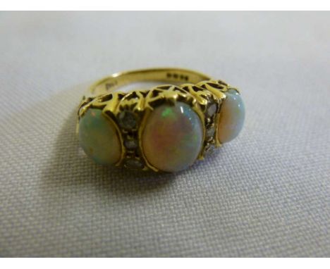 18ct yellow gold opal and diamond ring