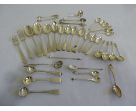 A quantity of silver flatware  (35)