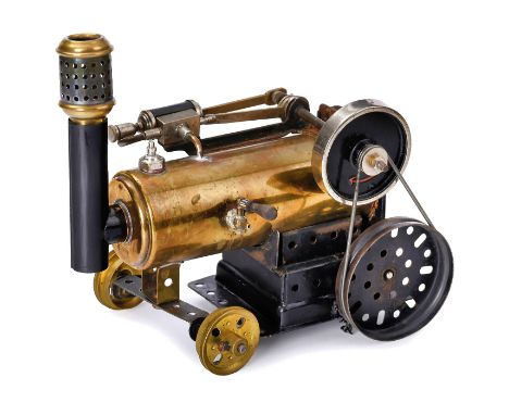 Verwandlungsmotor "Märklin Nr. 401", um 1930Verwendbar als stehende oder liegende Dampfmaschine, mit Dampfpfeife, feststehend