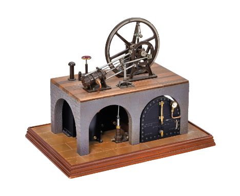 Modell einer Dampfmaschine, um 1980England; Bronze, Stahl und Messing, schrägliegender Zylinder, Ø 3,5 cm, Schwungrad mit Spe