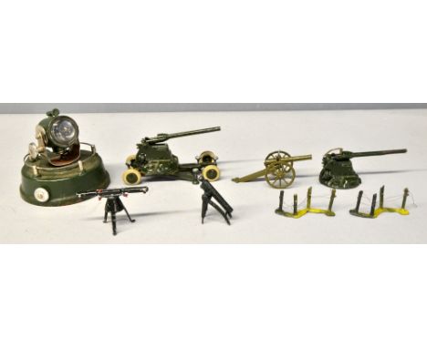 Britains, model of a search light, four guns, a sight, and two pieces of wire fence, (8),