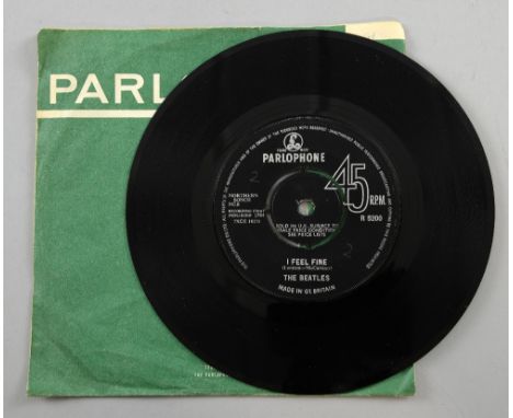 The Beatles, I Feel Fine 45 rpm single on Parlophone, 1964, mislabelled with same printing on both sides, R 5200, with sleeve