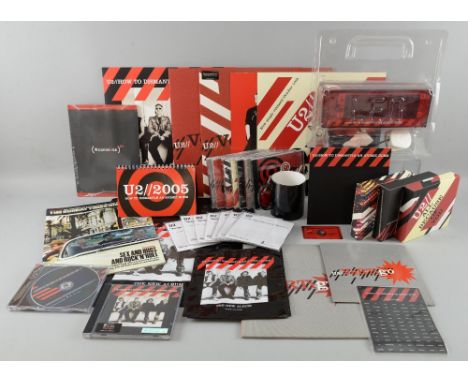 U2 How To Dismantle An Atomic Bomb full promo set including Vinyl album, 2 x Vertigo 12” singles plus 7” & 10”, mug, word gam