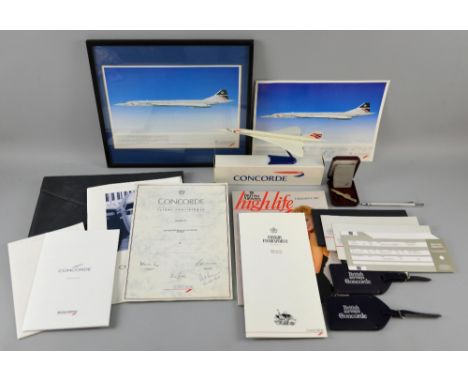 Concorde memorabilia including model aircraft, pen, luggage tags, silver tie pin, photo signed by Captain & Senior Flight Eng