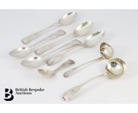 Four silver dessert spoons, Kings pattern including three Birmingham hallmark dated 1909, mm Elkington &amp; Sons, faint mono
