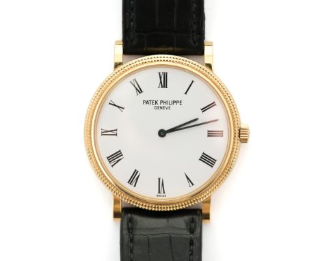 18ct Yellow Gold Patek Phillipe Calatrava Skeleton Back 2004 Automatic wrist watch. The watch case measuring 35mm, having a w