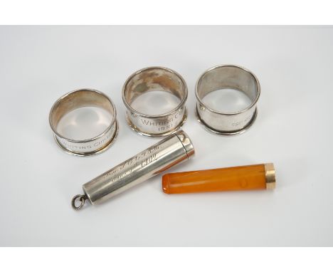 An amber and 15ct gold rimmed cigarette holder, approx 72mm in length, Birmingham hallmark dated 1901, mm S &amp; G Ltd compl