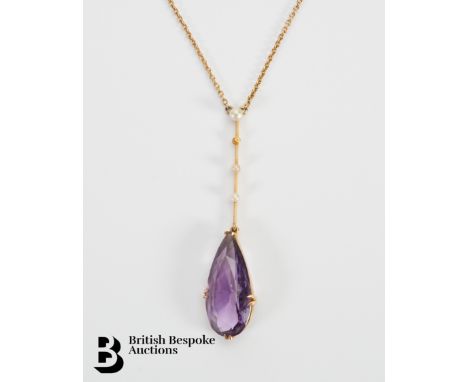 Victorian 14/15ct yellow gold tear-drop amethyst and seed pearl pendant. The amethyst pendant suspended from a solid bar link