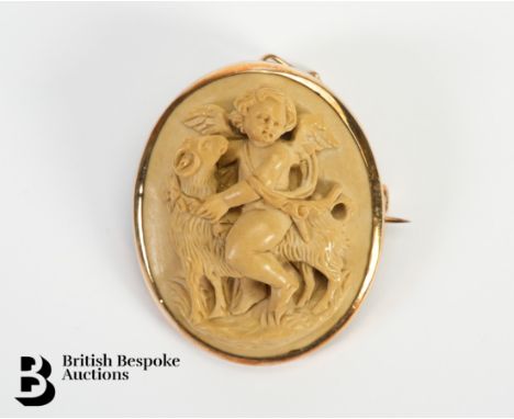 A vintage Italian 9ct gold oval lava cameo brooch, depicting a putti, approx 35 x 28mm, 10.2 gms.&nbsp;Condition ReportBase m