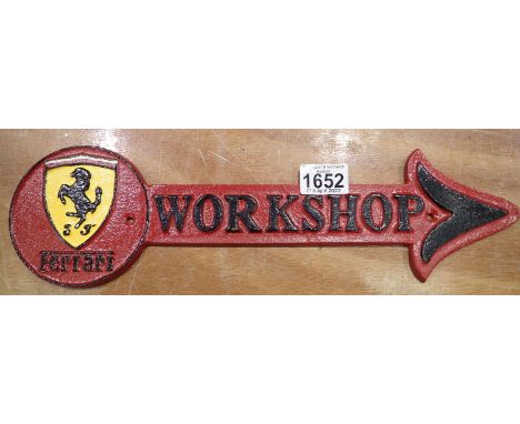 Cast iron Ferrari workshop arrow sign, 40 x 12 cm H. P&amp;P Group 2 (£18+VAT for the first lot and £3+VAT for subsequent lot