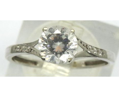 9ct white gold solitaire ring with stone set shoulders, size M, 1.4g. P&amp;P Group 1 (£14+VAT for the first lot and £1+VAT f