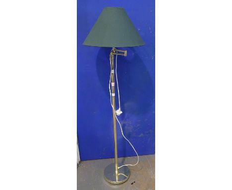 Brass standard lamp with movable light. Not available for in-house P&amp;P, contact Paul O'Hea at Mailboxes on 01925 659133
A