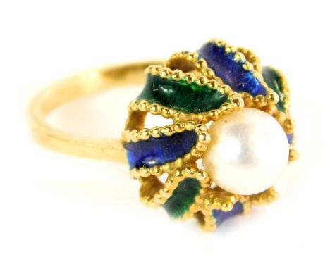 An enamel dress ring, with central cultured pearl, with raised twist blue and green enamel, on a yellow metal band stamped 75