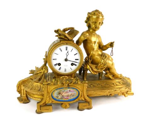 A 19thC French gilt metal mantel clock, the white circular enamel dial bearing Roman numerals for Henry Marc Paris, eight day