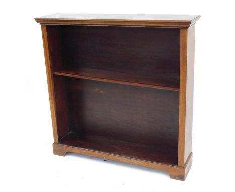 A mahogany open bookcase, with one adjustable shelf, 104cm high, 107cm wide, 27cm deep.