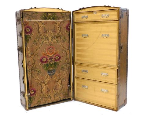 An early 20thC The Victor metal bound trunk, 45cm high, 102cm wide, 56cm deep.