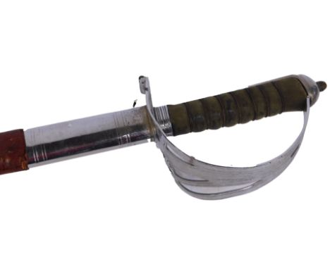 A British Army officer's dress sword, with wire bound leather grip, the blade with inscribed decoration in a leather scabbard