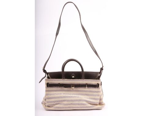 ASPREY London a brown leather and canvas laptop bag with silver coloured hardware and long strap. (36cm wide x 29cm high x 16