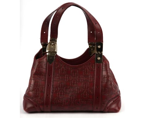 GUCCI A rare vintage 1990s/Y2K burgundy wine coloured leather top handle handbag with snaffle horse-bit embossed logo and gol