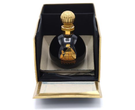 LANVIN (Vintage perfume. Now discontinued.) A black and gold box containing a nearly full flacon of APERGE scent. Classic Par