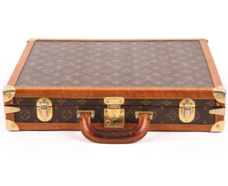 LOUIS VUITTON A vintage monogrammed canvas and leather PRESISIDENT style rigid briefcase with clochette including working key
