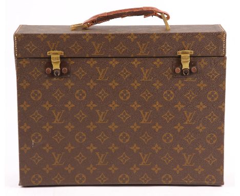 LOUIS VUITTON A rare vintage monogrammed canvas and leather PRESISIDENT style rigid briefcase/ writing case with drop front. 